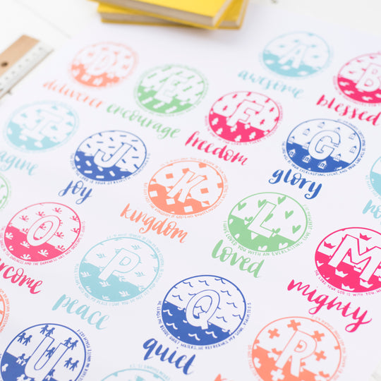 A poster with the whole alphabet with Bible verses around each letter in bright and cheerful colours
