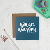 You are awesome white hand lettering on teal square greeting card