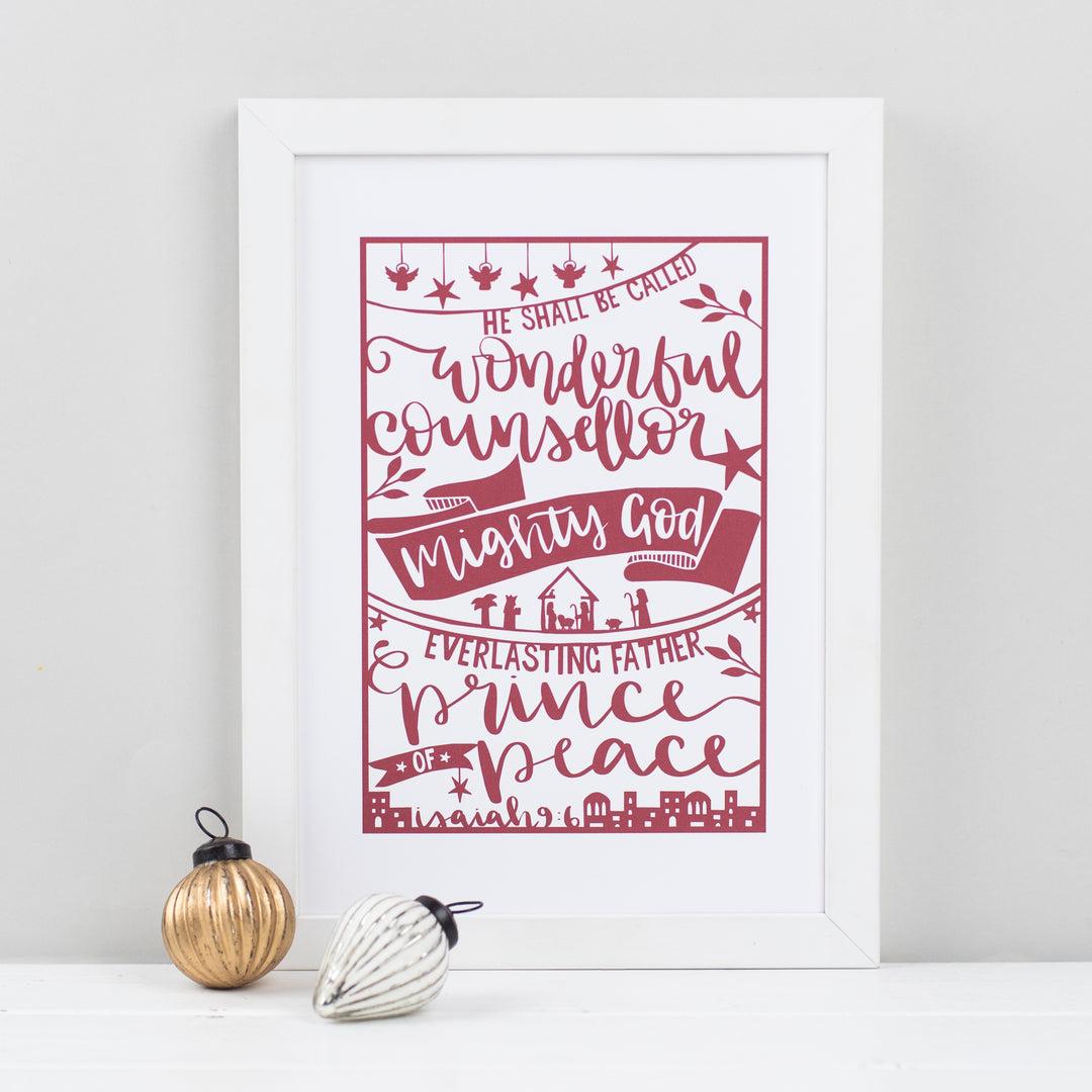 Festive print printed with a hand-drawn paper cut style design in red on white featuring the beautiful words of Isaiah 9:6
