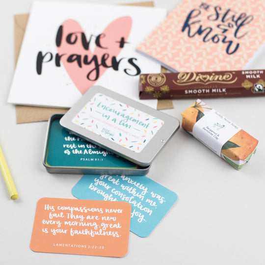 Thinking of you box with love & prayers card, divine chocolate, be still & know notebook, soap & encouragements in a tin