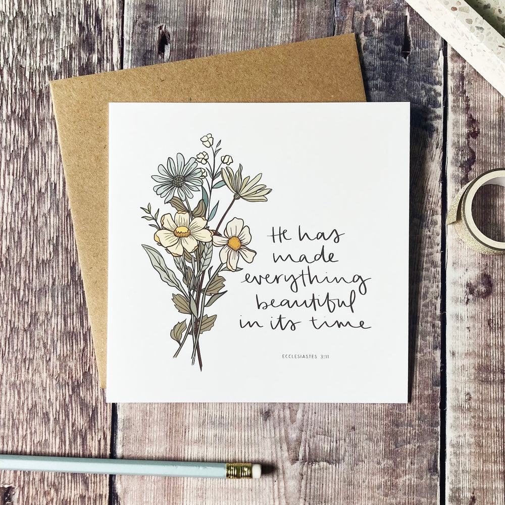 Card with floral design and the words of Ecc 3:11