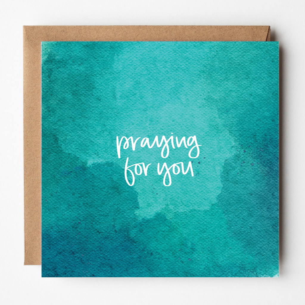 Teal watercolor card with 'praying for you' text on a white background