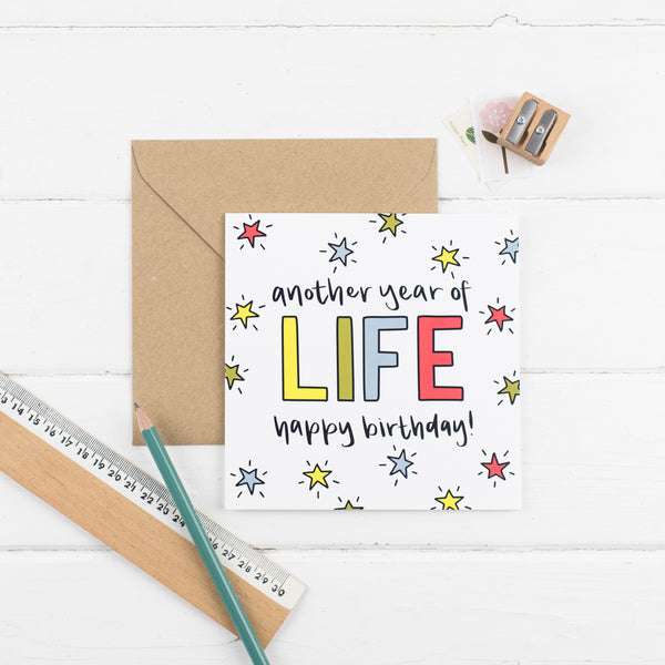 Another Year of Life square greetings card - primary colours with kraft envelope