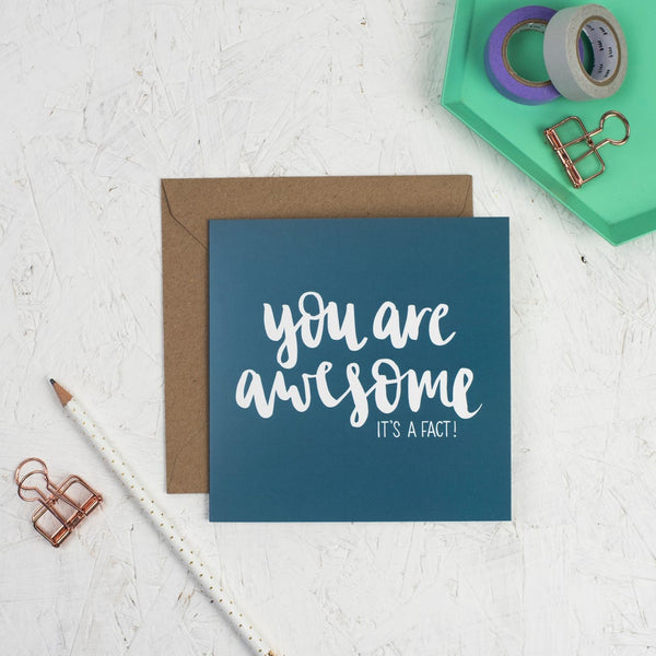 You are awesome white hand lettering on teal square greeting card