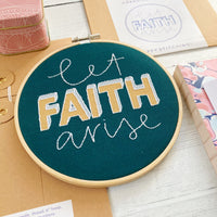 Close up of Blue and white Let Faith Arise embroidery kit