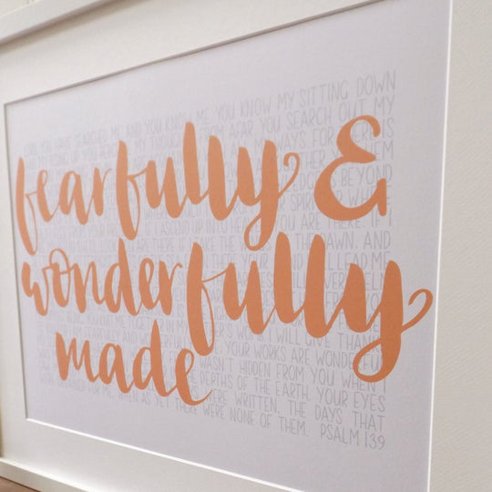 Hand lettered print with Fearfully and wonderfully made in the foreground & the words of 1-16 of Psalm 139 in the background