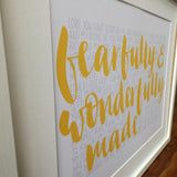 Hand lettered print with Fearfully and wonderfully made in the foreground & the words of 1-16 of Psalm 139 in the background