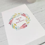 beautiful floral wreath print with the  hand lettered phrase 'yes and amen' in green, blue, pink and burgundy